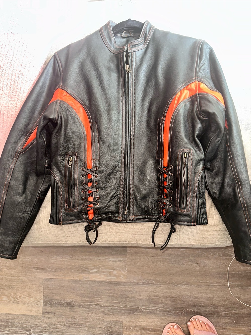Women’s Black Leather Jacket with Orange Accents